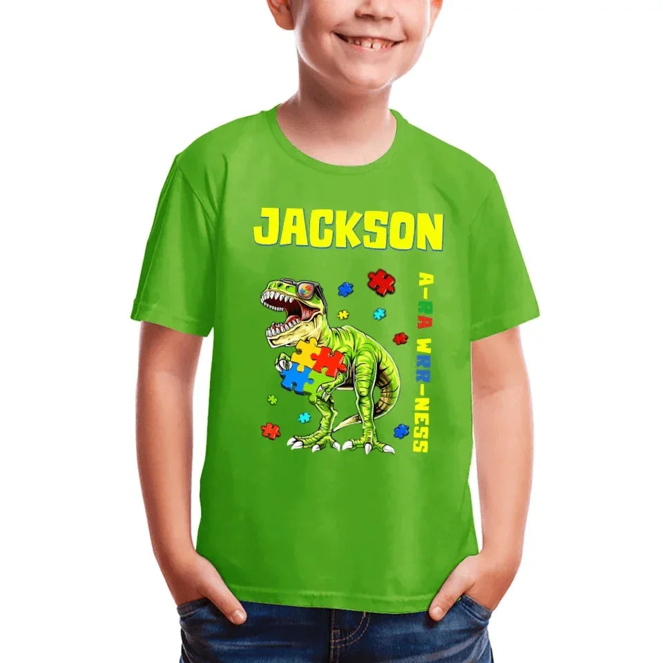 Puzzles and Dinosaurs - Personalized Name Colourful Graphic T-Shirt - A Gift for Child - Joliny