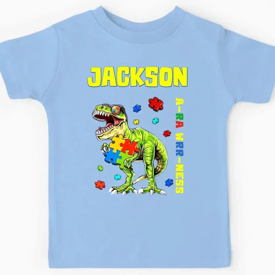 Puzzles and Dinosaurs - Personalized Name Colourful Graphic T-Shirt - A Gift for Child - Joliny