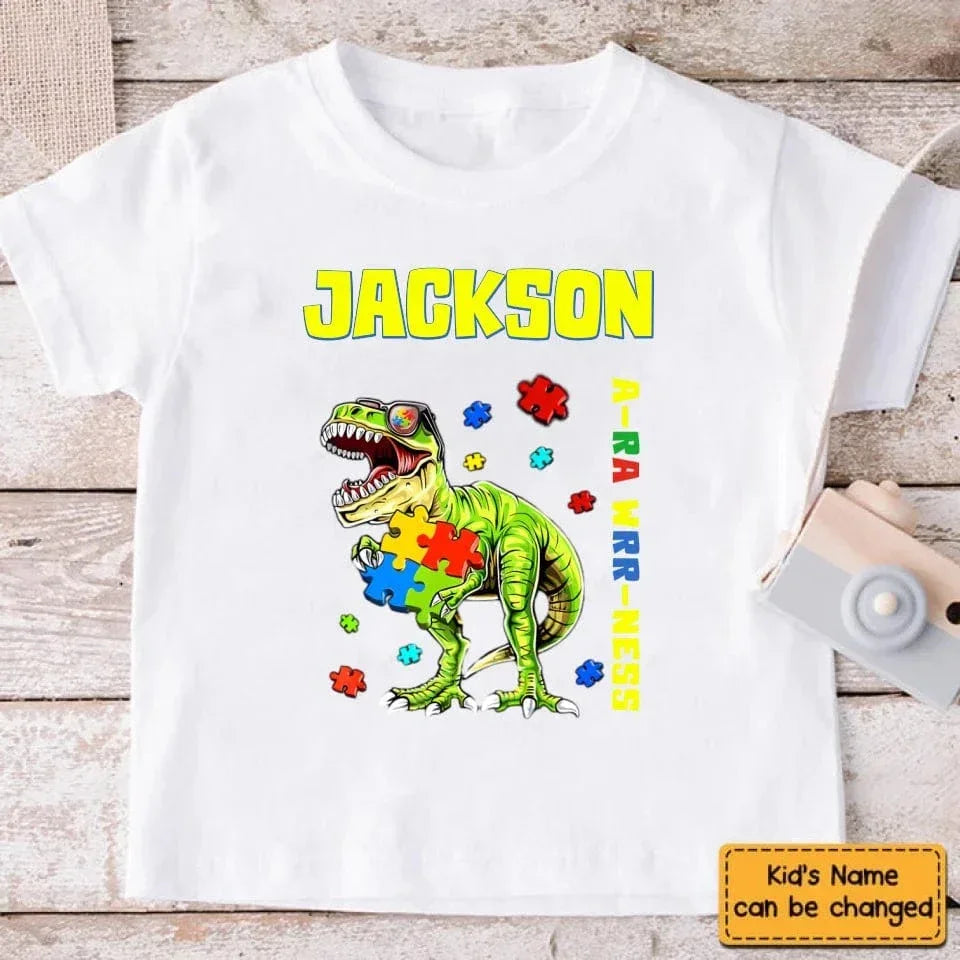 Puzzles and Dinosaurs - Personalized Name Colourful Graphic T-Shirt - A Gift for Child - Joliny