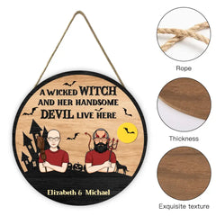 A Wicked Witch And Her Handsome Devil Live Here - Couple Personalized Custom Round Shaped Home Decor Witch Wood Sign - Halloween Gift For Witches, Husband Wife