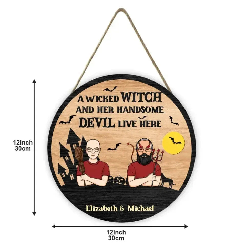 A Wicked Witch And Her Handsome Devil Live Here - Couple Personalized Custom Round Shaped Home Decor Witch Wood Sign - Halloween Gift For Witches, Husband Wife - Joliny