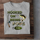 Hooked On Being Grandpa Fishing Camouflage Personalized Shirt, Father's Day Gift For Grandpa, Dad, Husband - Joliny